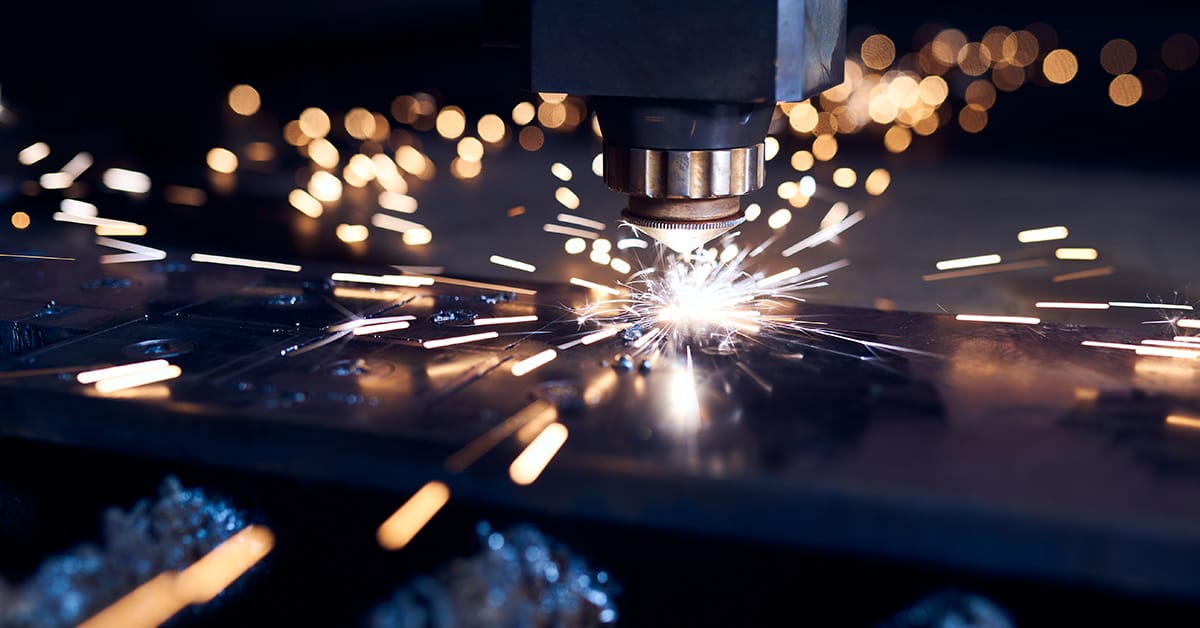 cnc laser cutting machine cutting into steel