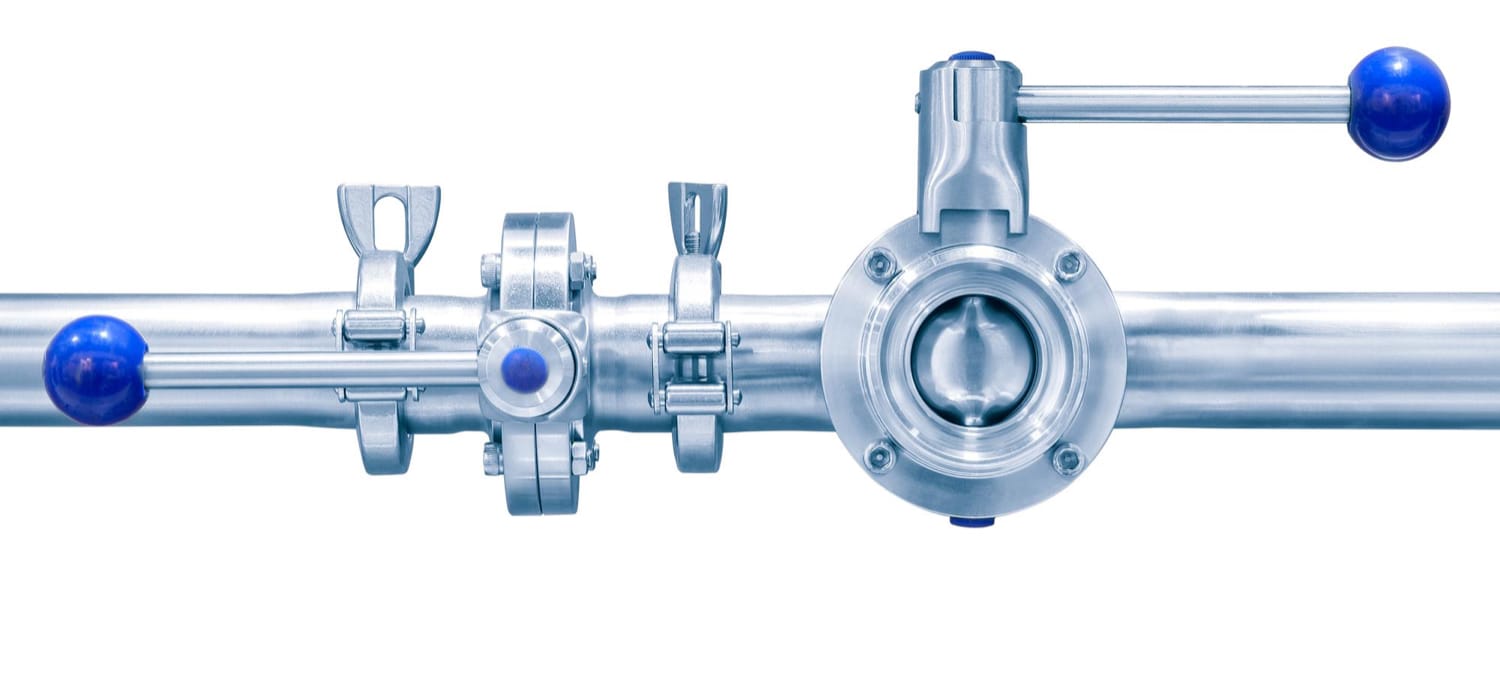 High-quality stainless steel industrial piping featuring blue-handled valves, precision clamps, and durable fittings, expertly fabricated using advanced CNC machining and metalworking techniques, displayed against a clean white background.